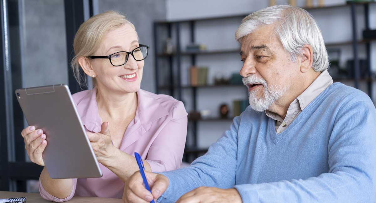 A companionate carer offering guidance and support to an elderly