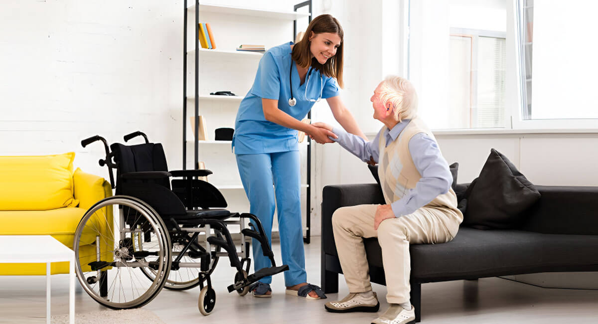 A carer providing elderly care to a person who is struggling to walk.