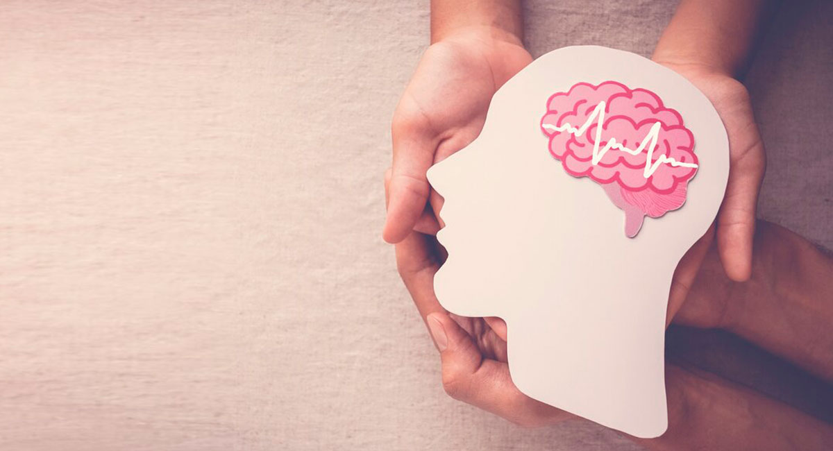 People holding a human head image signify the value of mental health