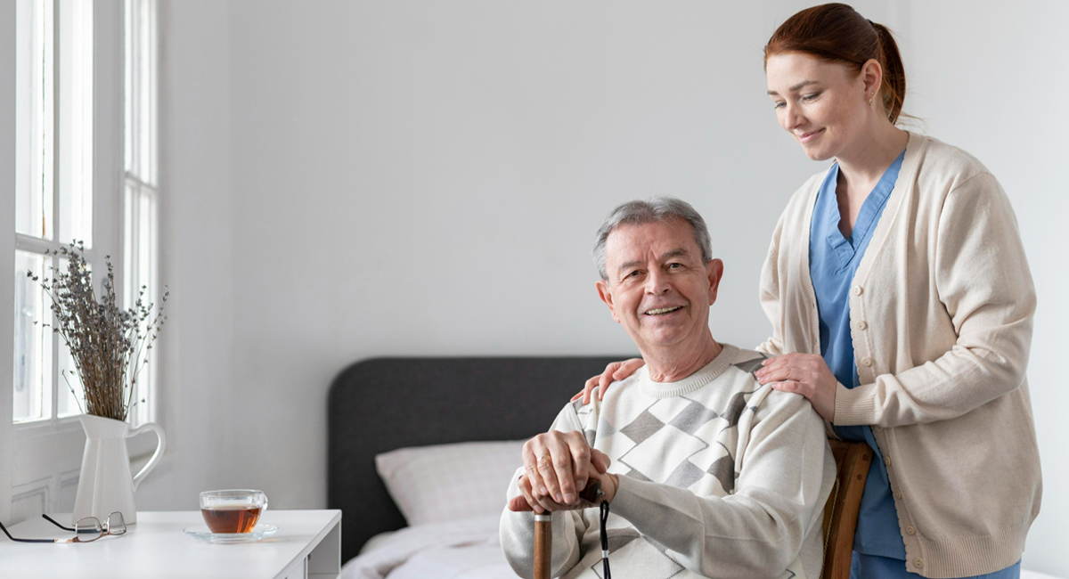 A respite carer providing assistance to an elderly man who is disabled.